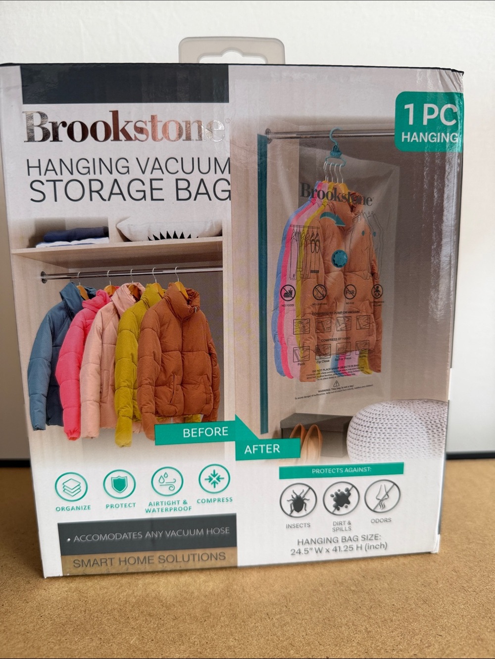 Brookstone Hanging Vacuum Storage Bag with Teal Trim and Clear Body